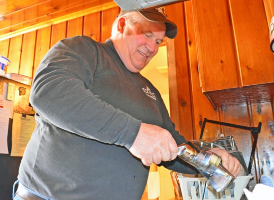 Jerry Regenscheid, a member of St. Paul Plumbers Local 34, installed a new faucet for a St. Paul homeowner during the union’s “Water’s Off” day of service April 5.