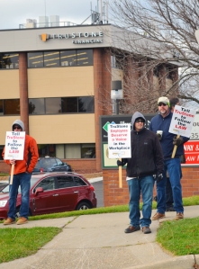 Supporters stage informational picketing outside TruStone's Burnsville branch, which opened with non-union staff two days after TruStone closed a union facility in nearby Apple Valley.