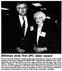 Wayne and Joan Wittman accept an award for their activsm from the DFL Party.