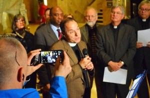 Pastor Bradley Schmeling explains his support for a citywide earned-sick-time ordinance during a press conference at St. Paul City Hall.