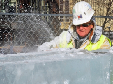 Dick Kentzelman, a retired Bricklayer, shaves down an ice block – an example of how work on the Winter Carnival palace allows volunteers to step out of their element. “It’s out of the ordinary for anyone in the trades to be using a chainsaw on the jobsite,” longtime volunteer Terry Wong said.