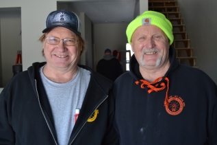 IBEW Local 110 retirees Bob Delesha (L) and Steven White are mainstays of the union’s Habitat volunteer projects in Rice County.